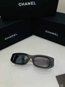 CHANEL CH5493 Col.01 Narrow Rectangular Sunglasses for Women, Polished Black Acetate Frame with White Temples & Silver Interlocking CC Logo, Polarized UV400 Protection Grey Lenses, 53mm